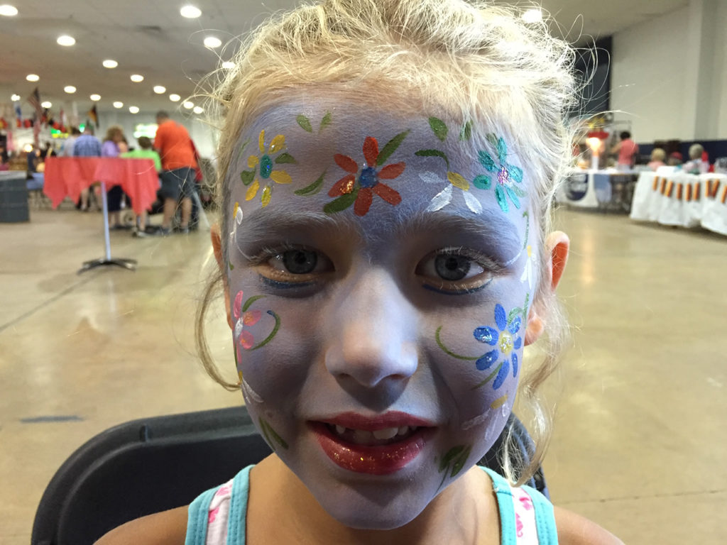 Girl with flowers painted on her face