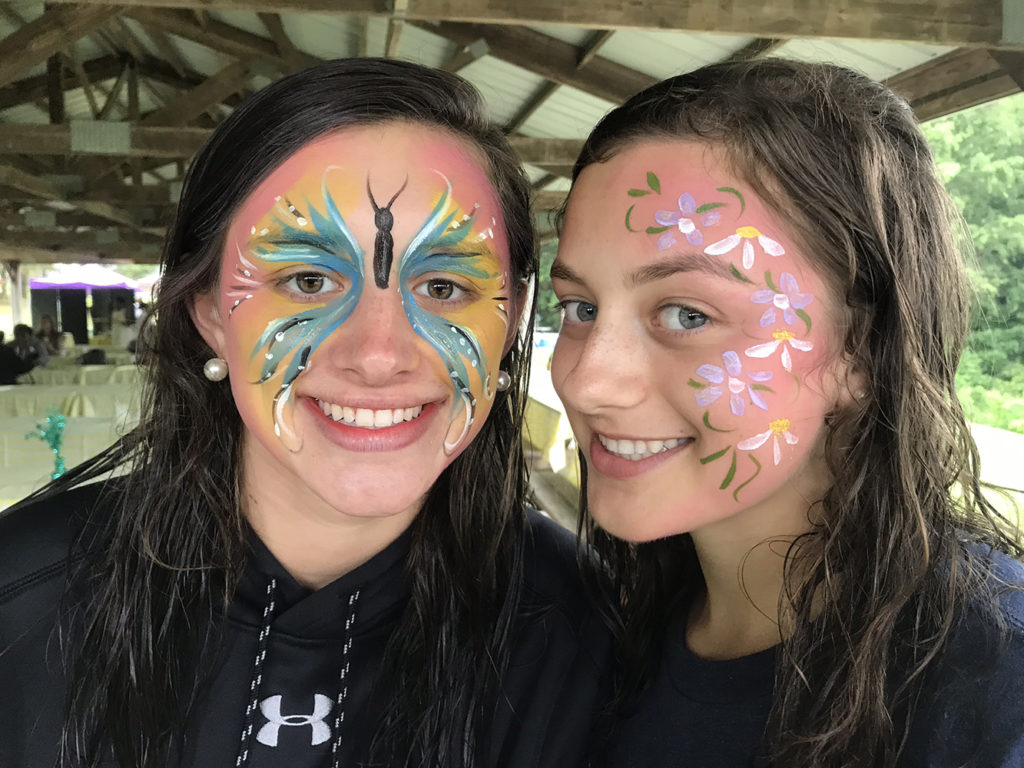 Two girls with their face painted